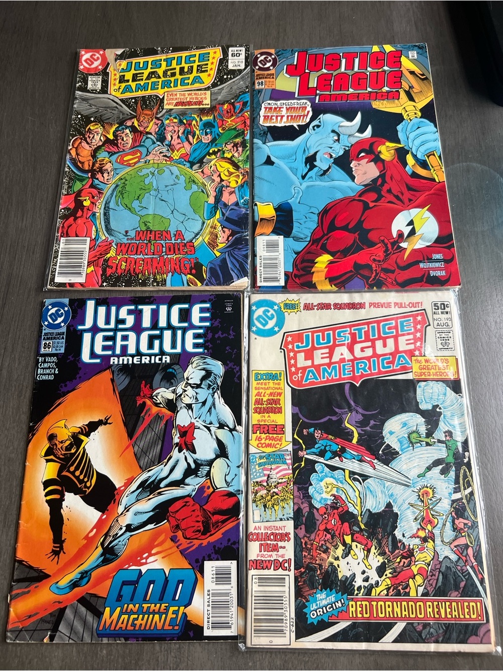 DC Comics Justice League of America Comic Covers - Red, Blue, Black, Yellow